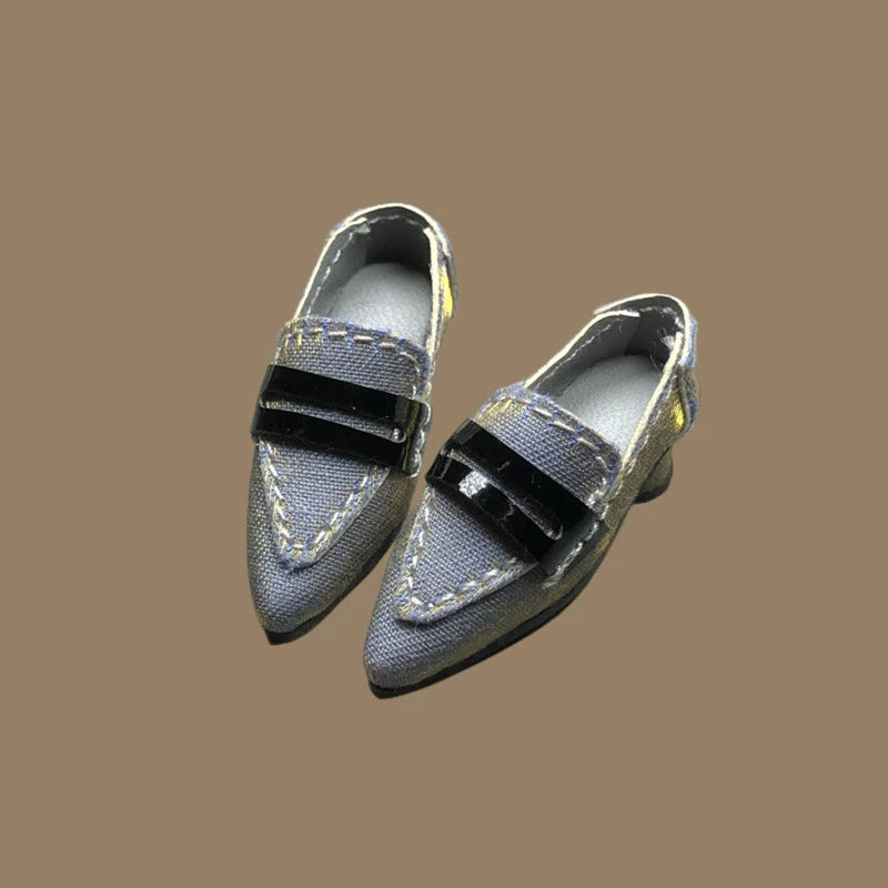Blue-base low-heel doll pumps with metal chain detail and glossy nylon finish
