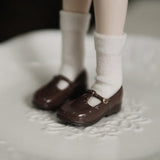Brown 1/6 scale vintage T-strap Mary Jane doll shoes with patent-look finish