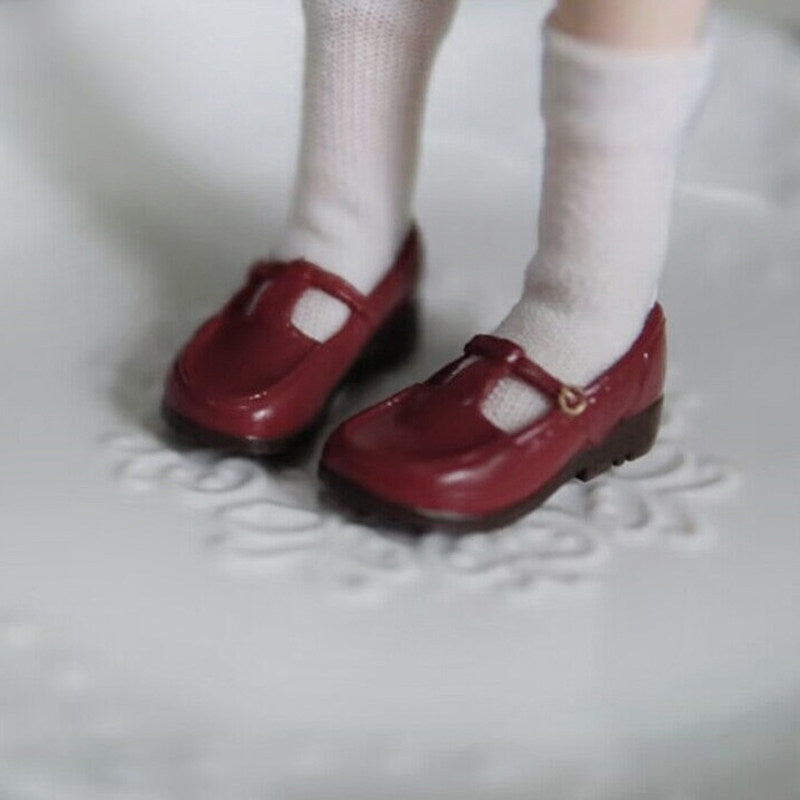 Red 1/6 scale vintage T-strap Mary Jane doll shoes with patent-look finish