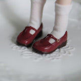 Red 1/6 scale vintage T-strap Mary Jane doll shoes with patent-look finish