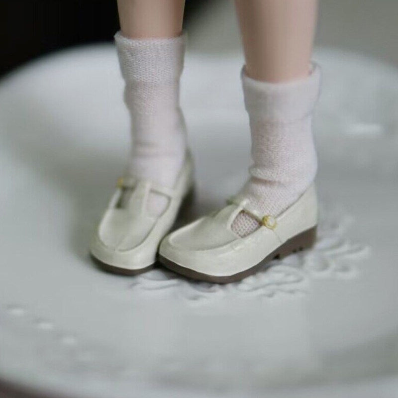 White 1/6 scale vintage T-strap Mary Jane doll shoes with patent-look finish