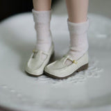 White 1/6 scale vintage T-strap Mary Jane doll shoes with patent-look finish