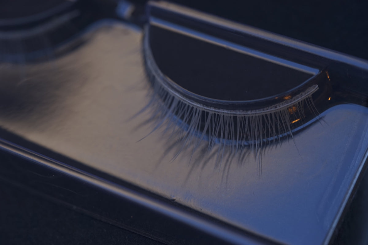 White BJD doll eyelashes close-up