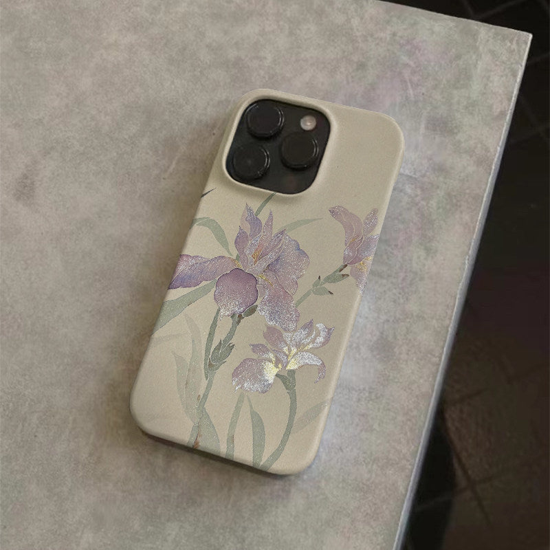 Elegant orchid floral iPhone case with refined design, available for multiple iPhone models.