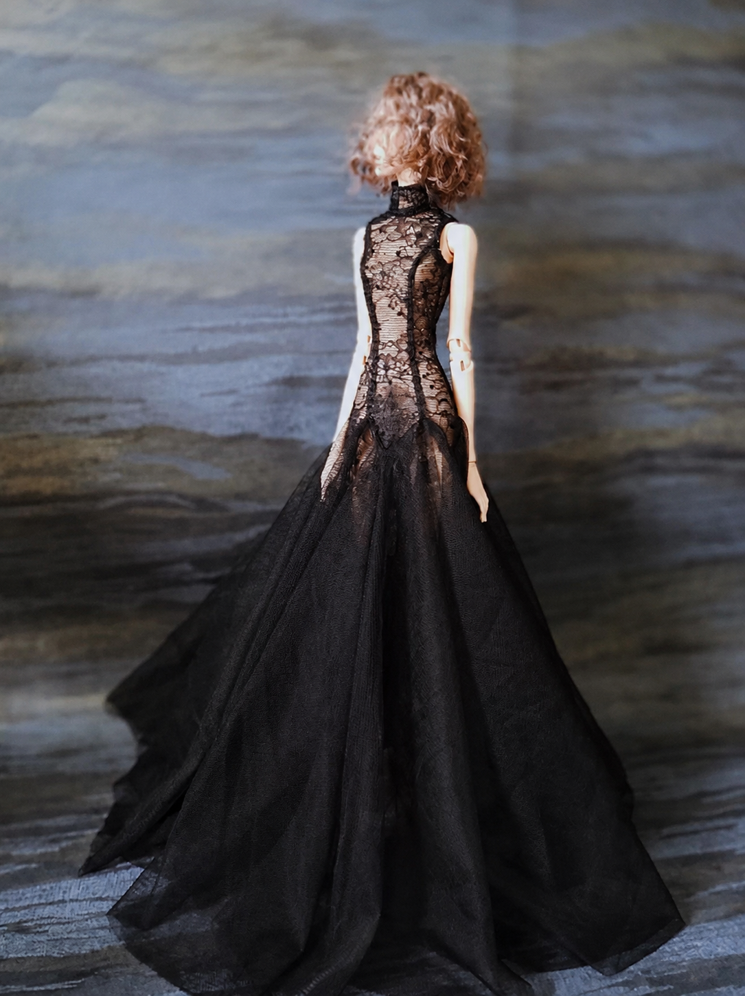 Full-length styling of a black mermaid dress for a 1/6 scale fashion doll.