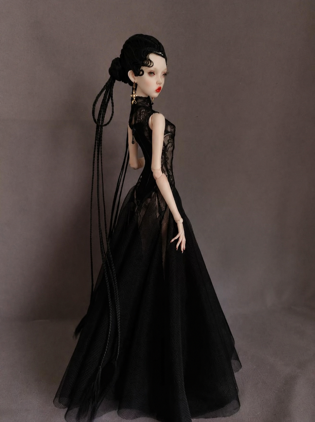 1/6 scale fashion doll wearing the Midnight Thorn black mermaid gown.
