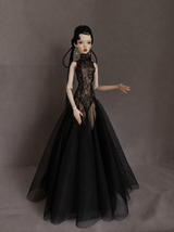 Dark romantic styling view of a black mermaid gown for a fashion doll.