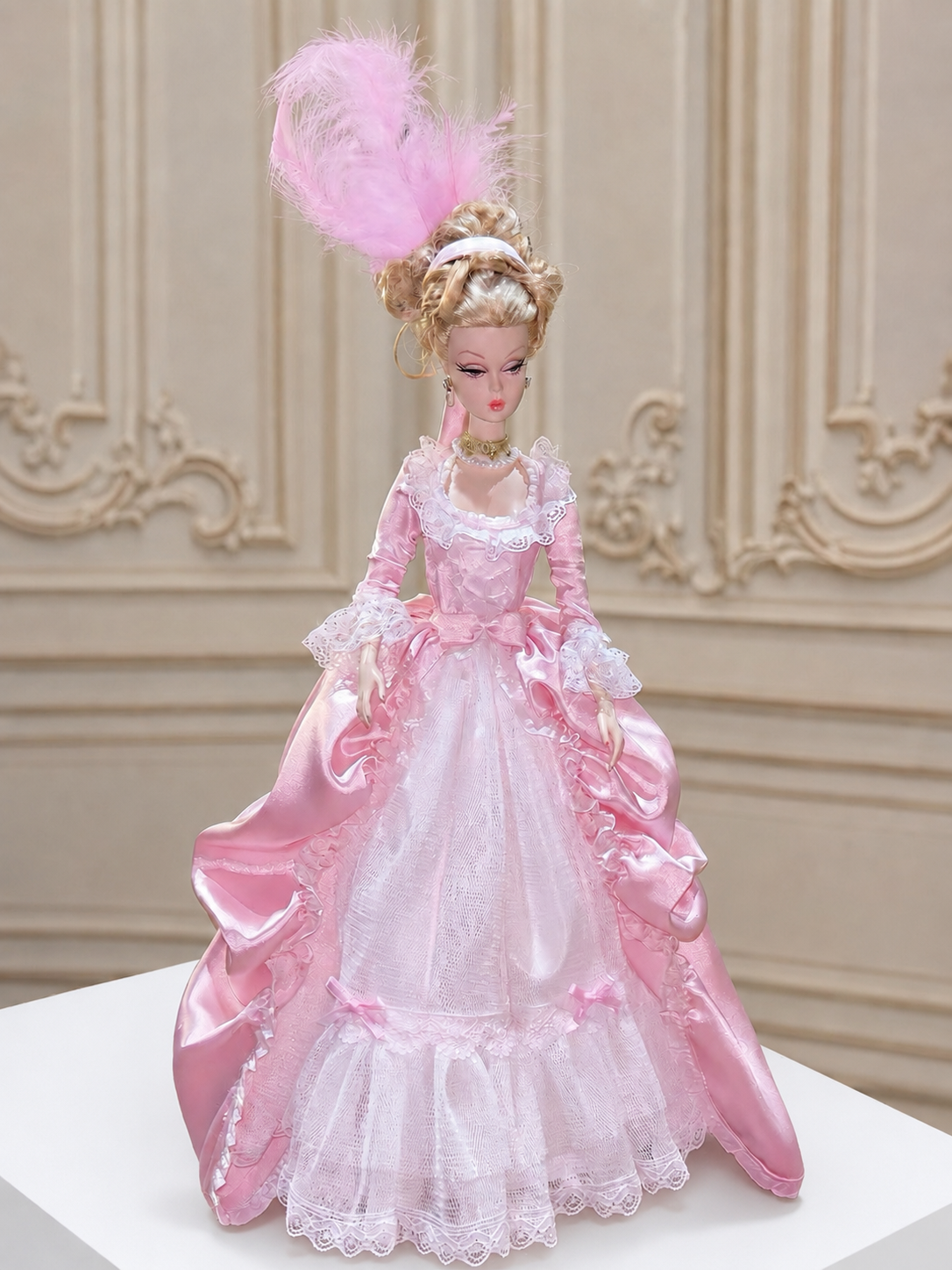 Front view of pink Rococo court dress for a 1/6 fashion doll with an embellished bodice