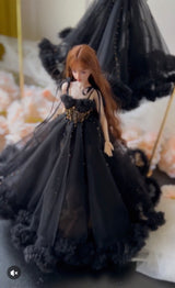 Black lace long gown styled on a 1/6 scale fashion doll in a dark setting.